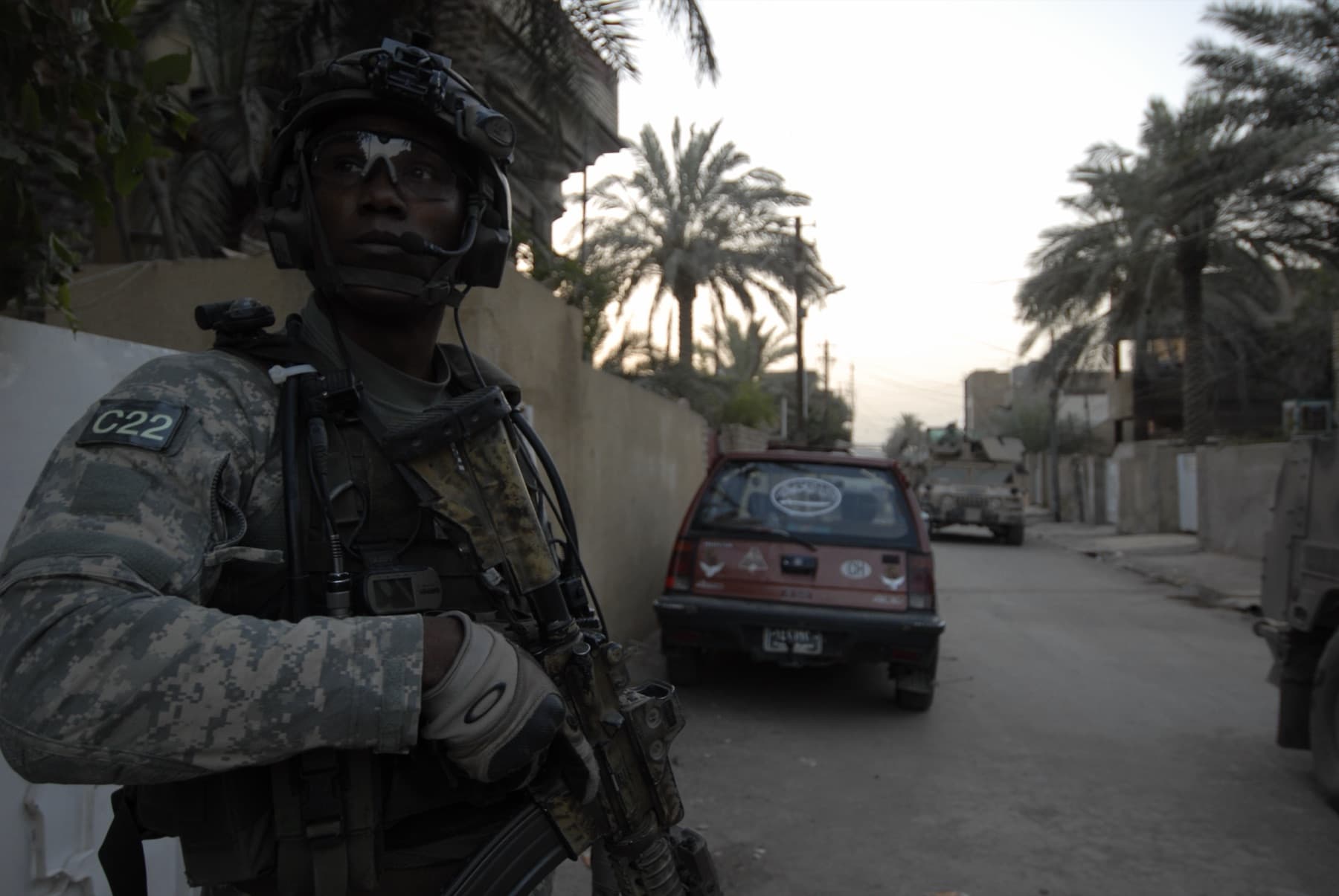 Sanfa Johnson on deployment, on patrol in uniform with a C22 unit patch