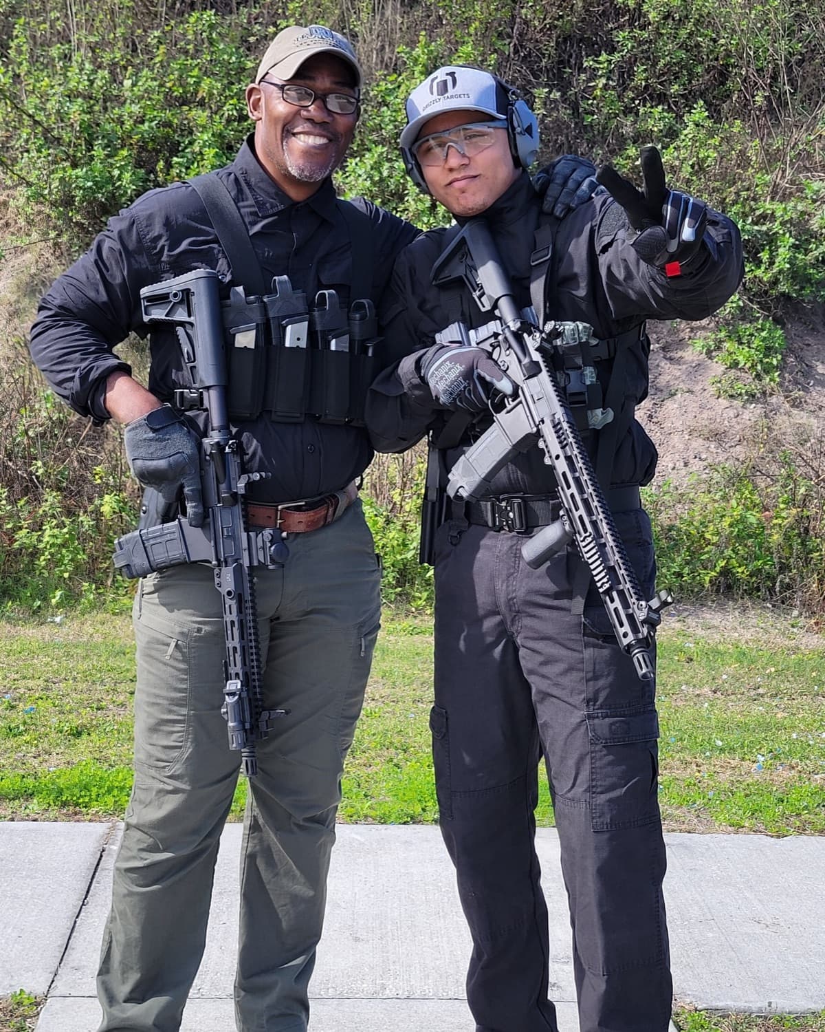 Sanfa Johnson with a student on the range after a training session